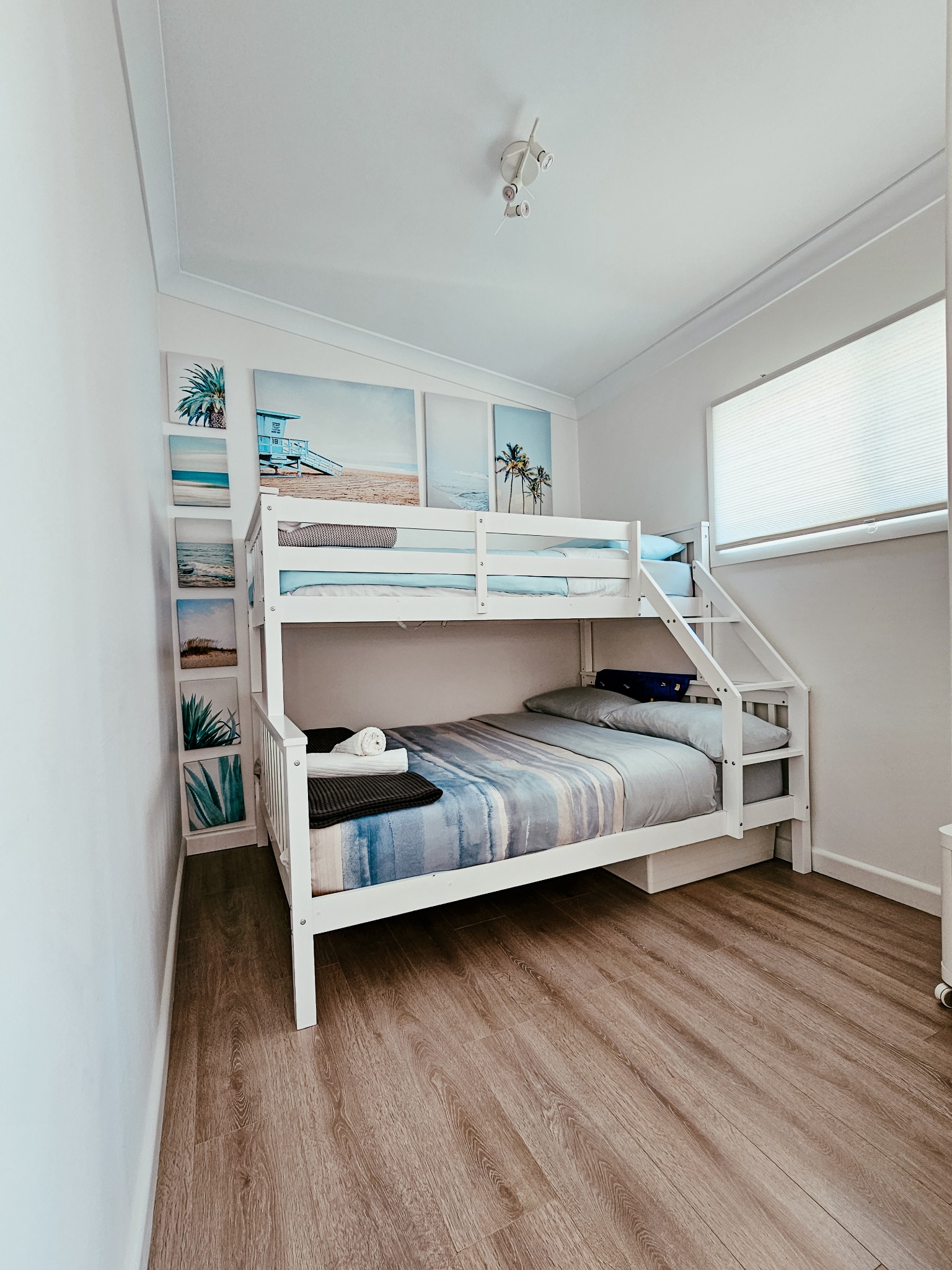Kids bunk room with TV and toys